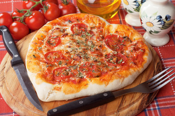 Heart shaped pizza margherita