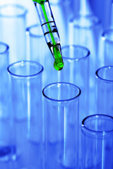 Test tubes on blue background