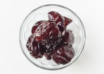 Dried Prunes in glass bowl