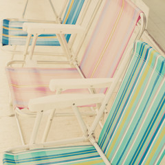 Fototapeta na wymiar Vintage colorful beach chairs