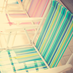Fototapeta na wymiar Vintage colorful beach chairs