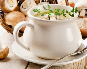 Creamy  soup and fresh mushrooms.