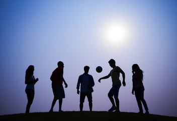 Silhouette of People Playing Soccer