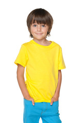 Cute little boy in a yellow shirt