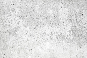 White concrete wall with stucco and paint, background texture