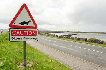 Road sign on a countryside road warning for otters crossing