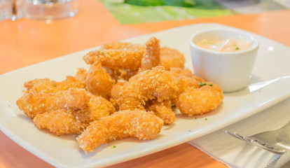 fried shrimp in white plate