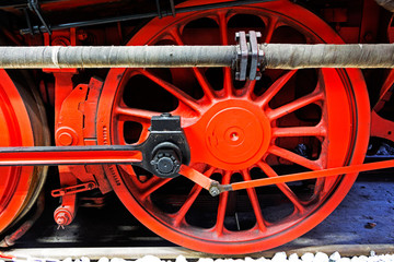 Fototapeta premium Wheels of an old locomotive on rails