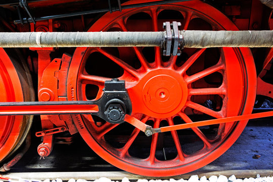Wheels  of an old locomotive on  rails