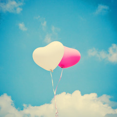 Obraz premium Heart shaped balloons in flight 