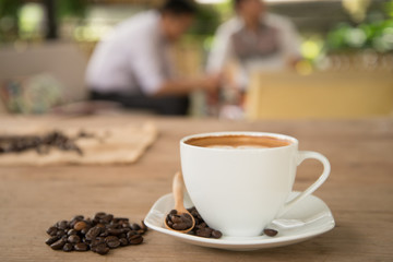 cup of coffee on table in cafe