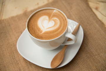 Cup of coffee with heart shape