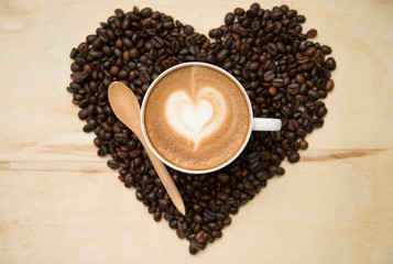 Cup of coffee with heart shape