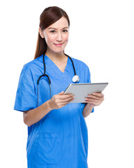 Doctor with tablet