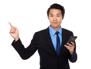 Businessman hold with cellphone and finger up