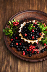 sweet tartlet with blueberries and cranberries