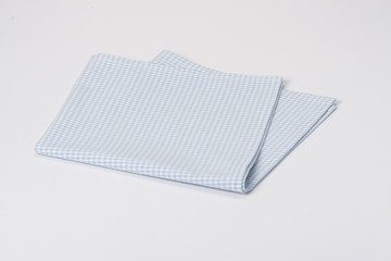 Folded Gingham Cotton Napkin On White Background