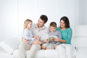 mother, dad and their little children