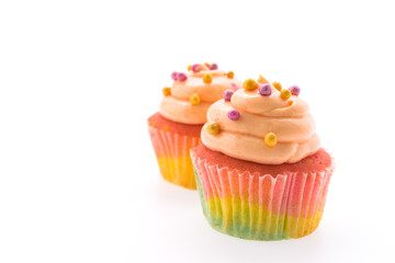 Colorful cupcakes isolated on white
