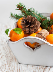 Christmas still life with tangerines