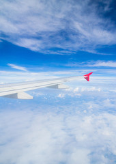 Obraz premium Plane in the Air Cloudscape Around