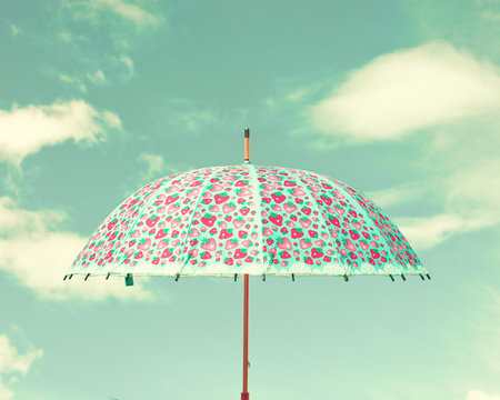 Vintage Colorful Umbrella And Sky With Clouds