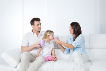 careful parents with little daughter