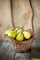 fresh pears in a wicker basket