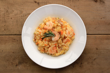 Risotto with shrimps, prosciutto and various vegetables - 71945927