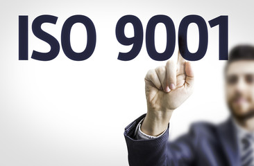 Business man pointing the text: Iso 9001