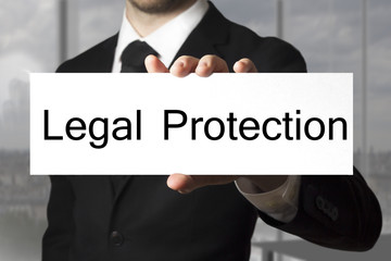 businessman showing sign legal protection