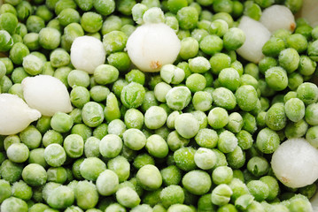 A Background of Frozen Peas and Onions