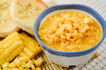 Corn chowder, corn on the background.