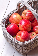 Fresh ripe apples in basket 