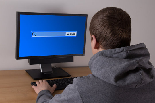 young man searching something in internet