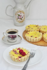 Cherry tarts with cream cheese filling, selective focus