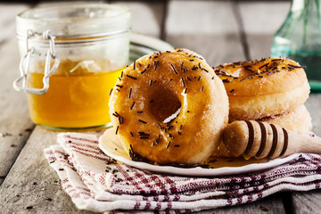 Breakfast with donuts and honey