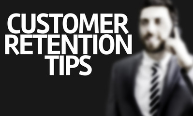 Business man with the text Customer Retention Tips