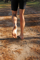Barefoot runner running with no shoes