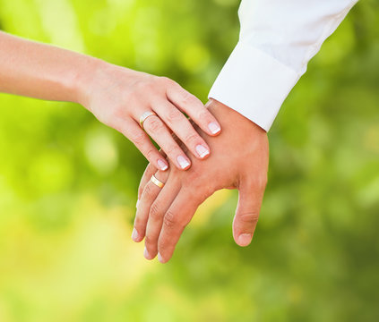 Hand of married people