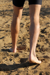 Obraz na płótnie Canvas Barefoot runner preparing for the activity