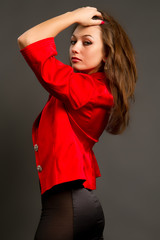 Fototapeta premium brunette in a red jacket
