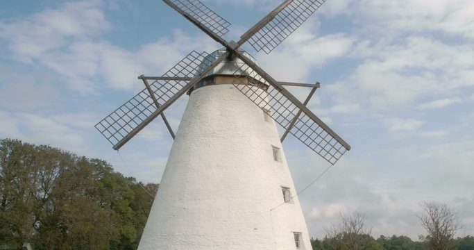 The old windmill with four blades in the farm