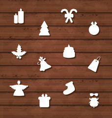 Set Christmas design elements on wooden texture