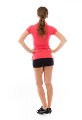 Fototapeta premium model isolated on plain background back hands on hips