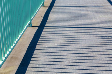 pattern of cologne Bridge with shadow from reling