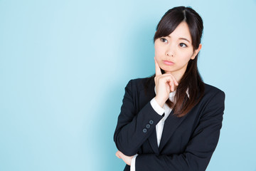 asian businesswoman on blue background