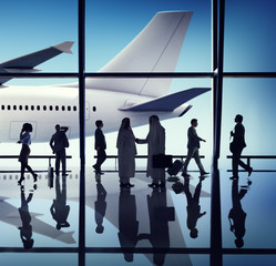 Silhouette Group of Business People with Airplane