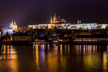 Fototapeta na wymiar The View on Prague gothic Castle with Charles Bridge