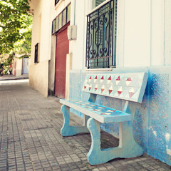 Vintage bench in a quiet street